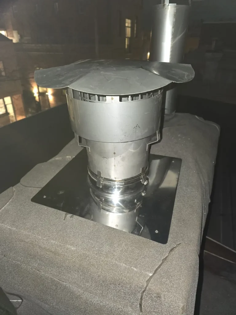 Metal liner termination and top plate at a Bloomsbury chimney