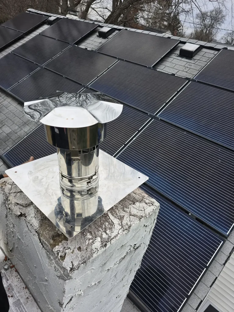 Metal liner termination and cap above a chimney in Fieldsboro