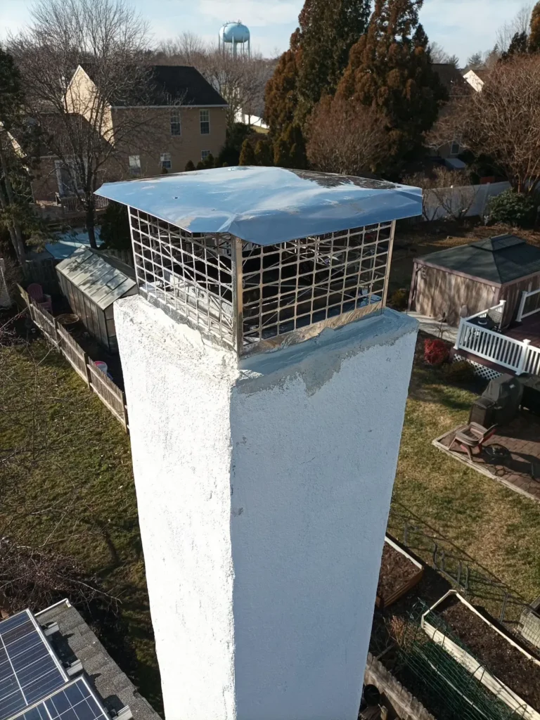 Chimney cap assembly and crown at a Glassboro home