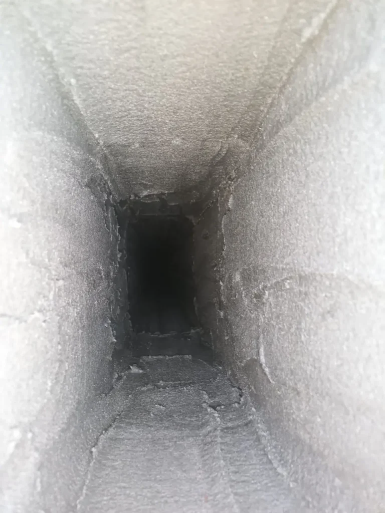 Interior view of a fireplace flue in Gloucester City