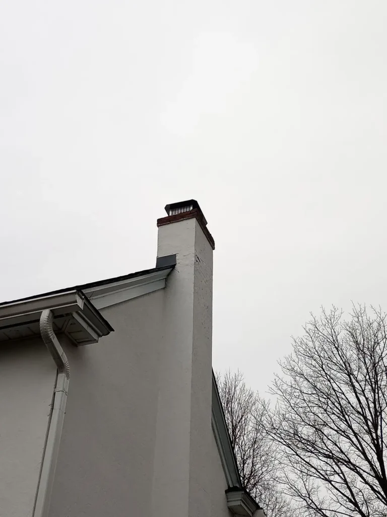 Exterior chimney and cap at a Mount Laurel Township home