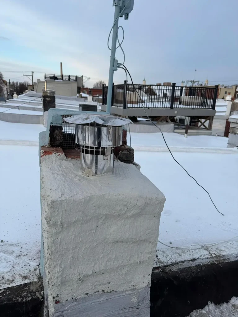 Chimney stucco surface and liner termination in Woodbridge Township
