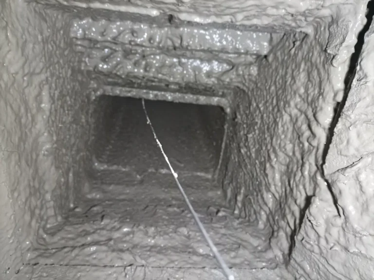 Interior smoke chamber surfaces and damper cable in Millville