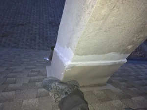 Roof flashing at the base of a Union chimney