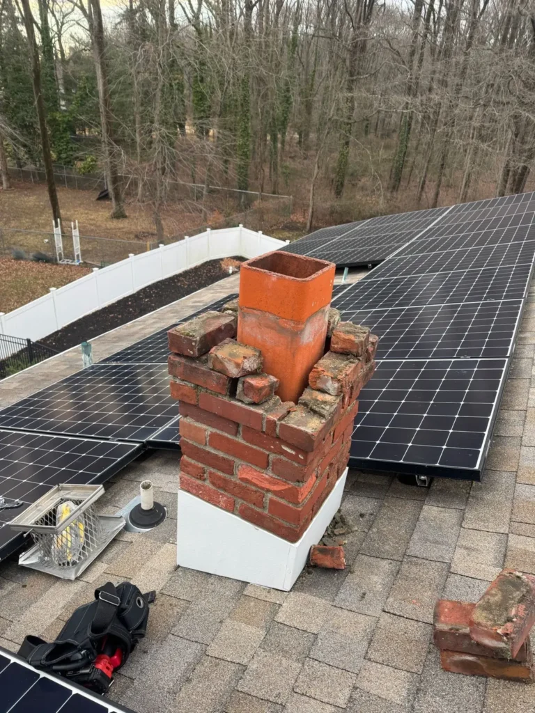 Open chimney top with brickwork around a clay flue in Cherry Hill Township