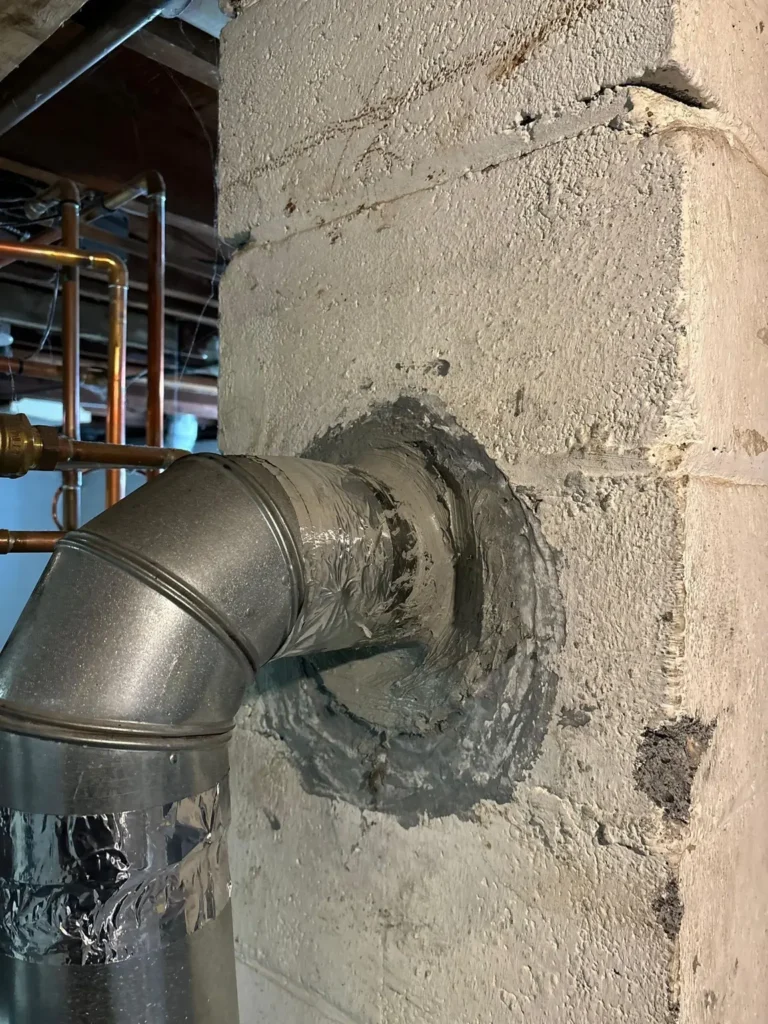 Vent connector entering the chimney wall in Roxbury Township