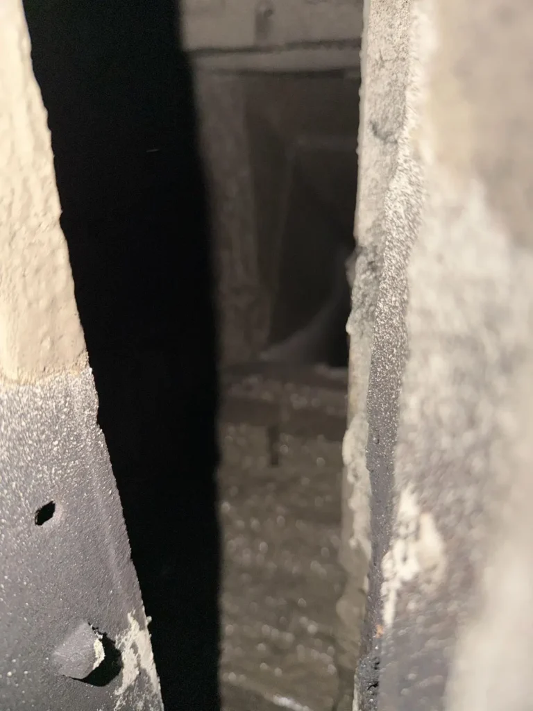 Close view through the fireplace throat toward the smoke chamber in Shrewsbury