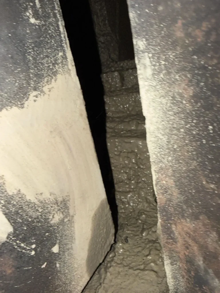 Detail of the smoke chamber viewed through the fireplace throat in Shrewsbury