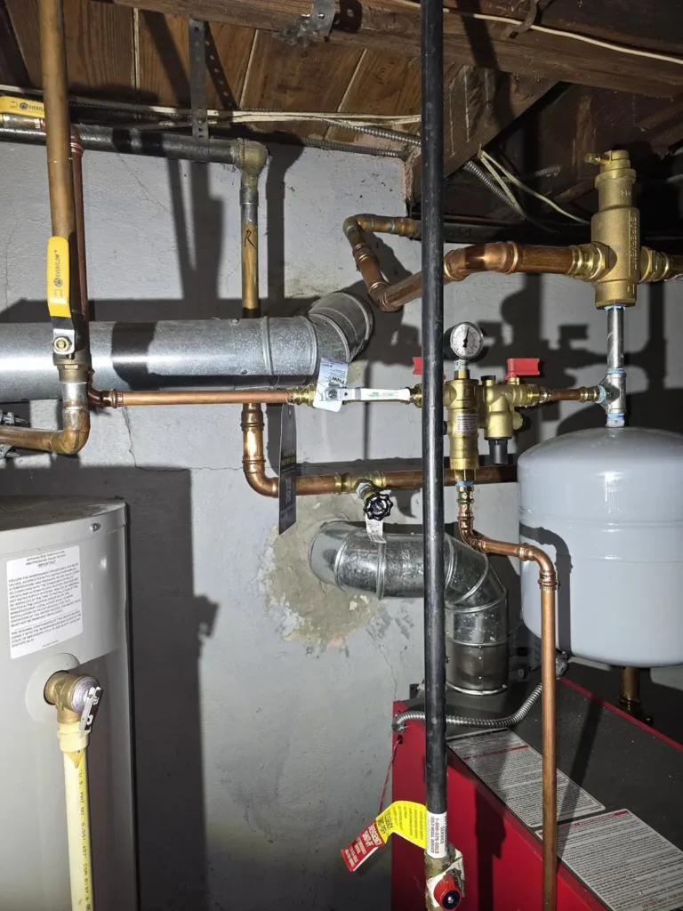 Basement heating equipment and chimney vent connections in Milltown